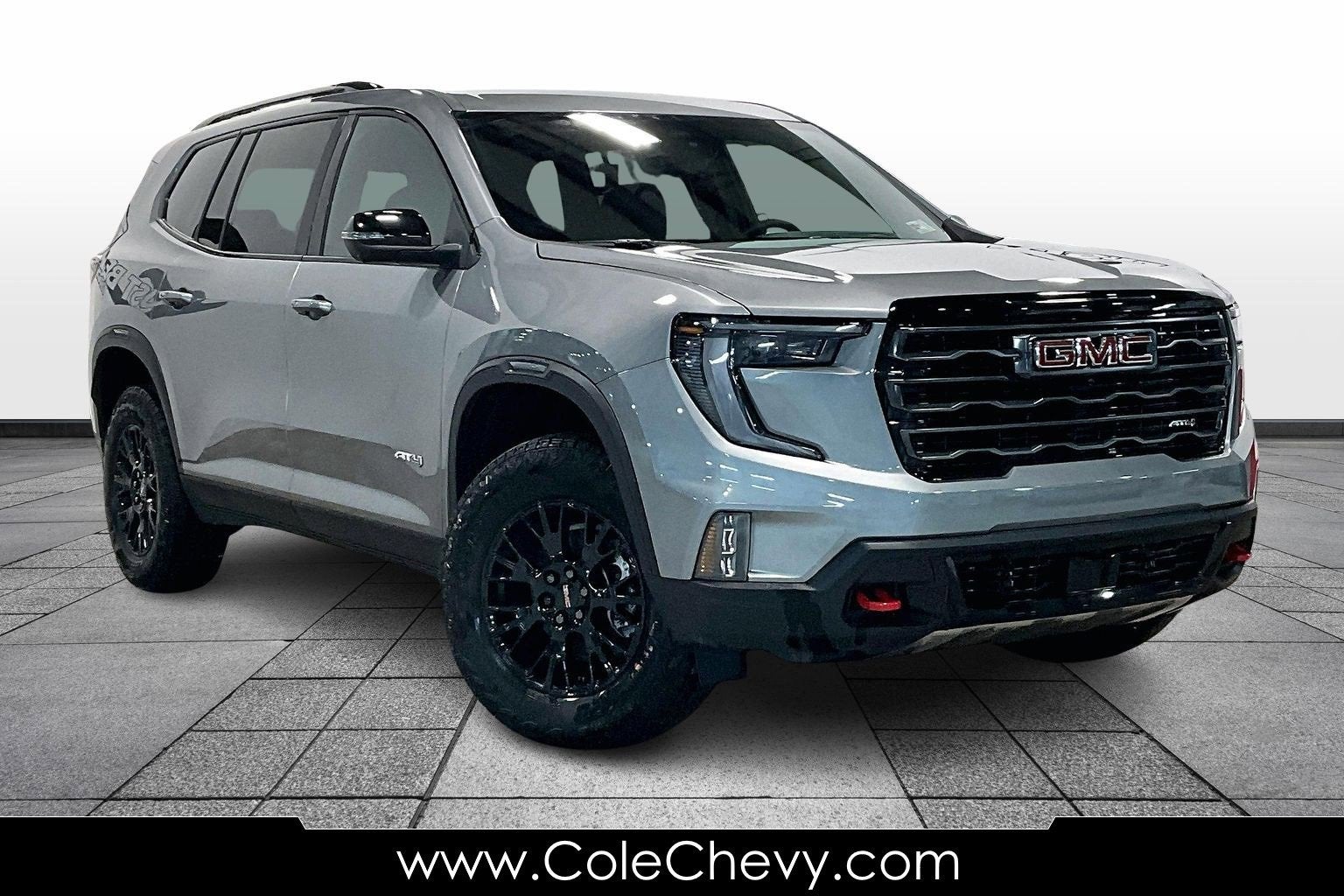2026 GMC Acadia AT4 in Sterling Metallic — front three-quarter view