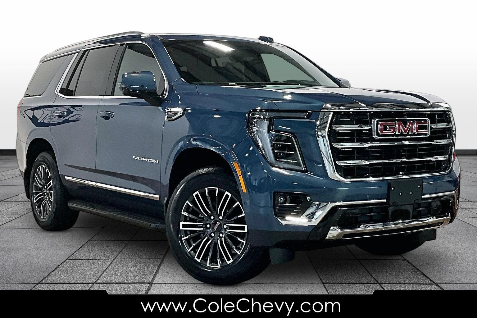 2026 GMC Yukon Elevation in Downpour Metallic — front three-quarter view