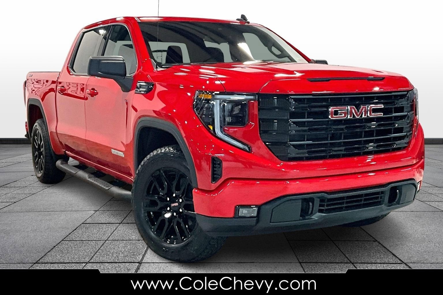 2026 GMC Sierra 1500 Elevation in Cardinal Red — front three-quarter view